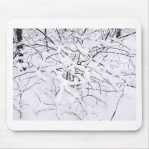 Snow on branches of the trees mousepad