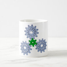 Some silver gears with a little green coffee mugs