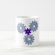 Some silver gears with a little purple coffee mug