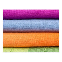 Stack of colourful cotton cloth postcard