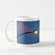 Street light against a sunset cloud mug