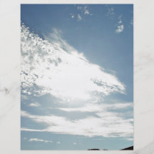 Sun-illuminated clouds flyer