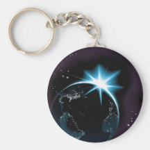 Sun rising over night time planet earth key chains