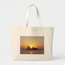 Sun Setting Behind A Container Ship Bags