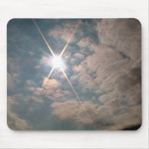 Sunburst through white clouds mousepad