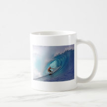 Surfer surfing a huge wave. mugs
