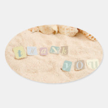 Thank you in letters on a sandy beach sticker