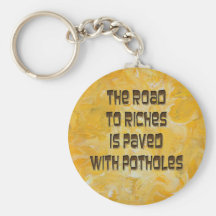 The Road to Riches is Paved with Potholes Keychain