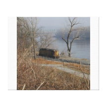 train car on missouri river stretched canvas print
