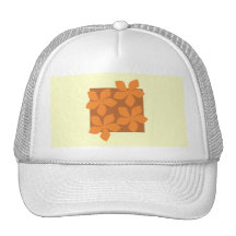 Tropical orange flowers on cream. trucker hat