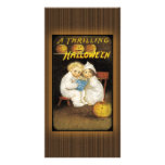 Two children reading ghost stories personalised photo card