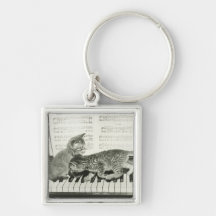 Two kitten playing on piano keyboard, (B&W) Keychains