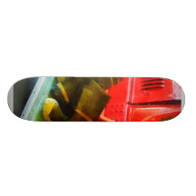 Two Pairs of Boots on Fire Truck Skateboards
