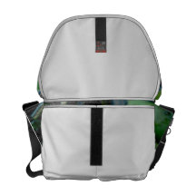 two purple water lilies messenger bags