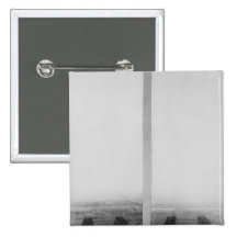 Two views of the construction of the Eiffel Pinback Button