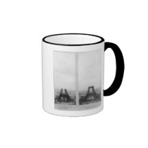 Two views of the construction of the Eiffel Mugs