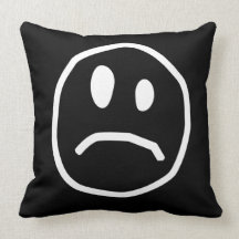 Unhappy face pillow