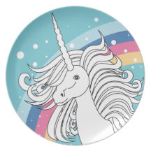 Unicorn surrounded by rainbow and dots blue party plates
