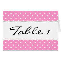 Wedding table place cards with pink background