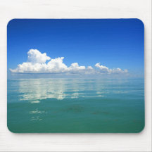 White cloud over a placid ocean mouse pad