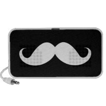 White handlebar moustache on black background travelling speakers