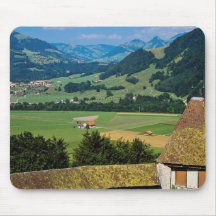 White The flowered courtyard of Gruyere Castle flo Mousepads