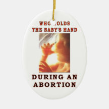 WHO HOLDS THE BABY'S HAND ORNAMENT