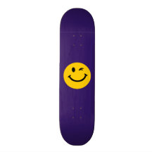 Winking smiley face skate decks
