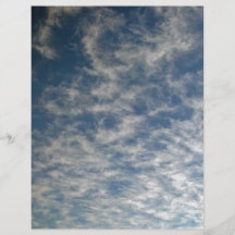 Wispy clouds against blue sky flyer