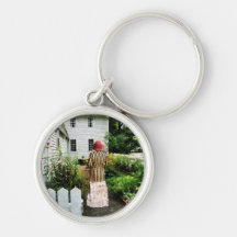 Woman With Striped Jacket and Flowered Skirt Keychain