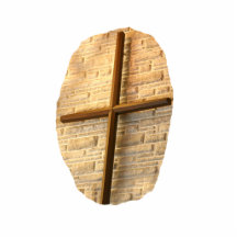 Wooden thin cross on white brick church wall cut outs