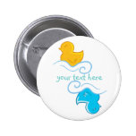yellow and blue rubber duck buttons