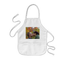 Young Couple Kissing Apron