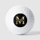 Search for black gold golf balls Dad