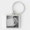 Search for dressing up key rings Looking at camera