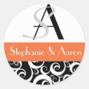 Search for black white orange stickers Initial