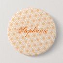 Search for orange flower badges Feminine