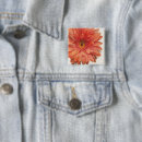 Search for orange daisy badges Gerbera