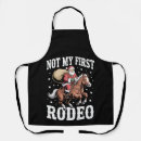 Search for cowboy aprons Santa