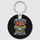 Search for i work hard key rings Better