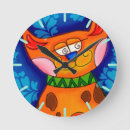 Search for orange tabby cat clocks Kitten