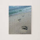 Search for footprints in the sand puzzles Waves