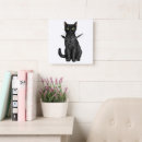Search for black cat clocks Kitten