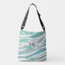 Search for turquoise handbags Initial
