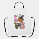 Search for vintage cat and dog aprons Trick or treat