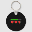 Search for pixel heart key rings Insert coin to play