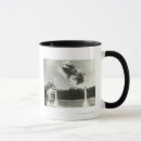 Search for dogs jumping mugs Agility