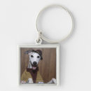 Search for dress up key rings Looking at camera