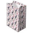 Search for dinosaur gift bags Festive