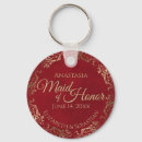 Search for gold and red key rings For her